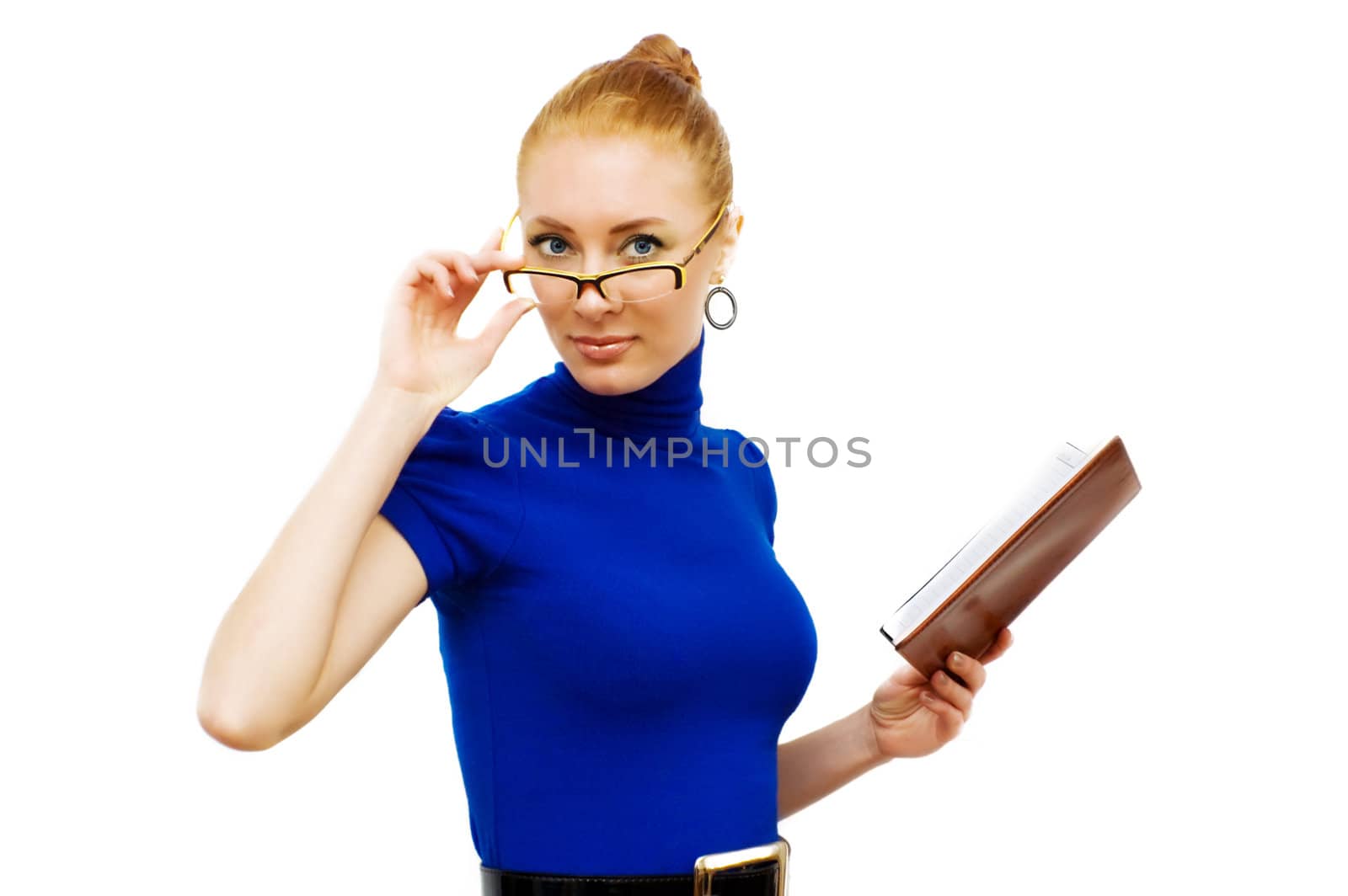 Red-head businesswoman looking through glasses with notebook over white