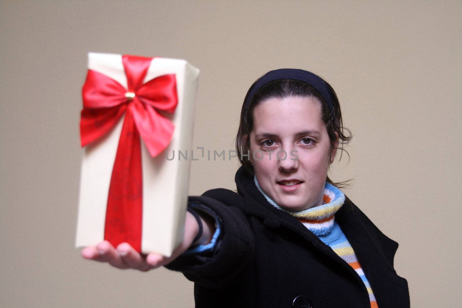 young girl giving gifts (focus on the girl)