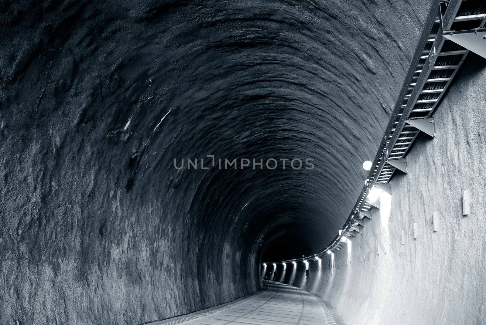 It is a blue and lonely tunnel.