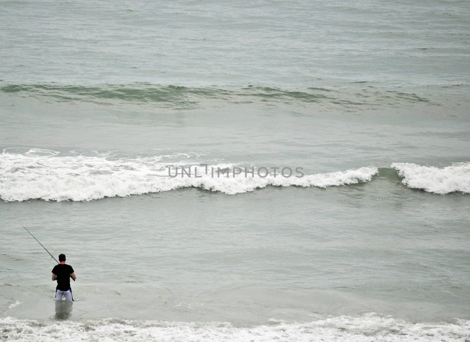 Fishing in the waves