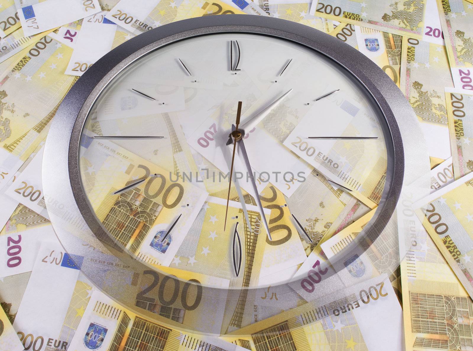 A clock and 200 euro banknotes on a white background