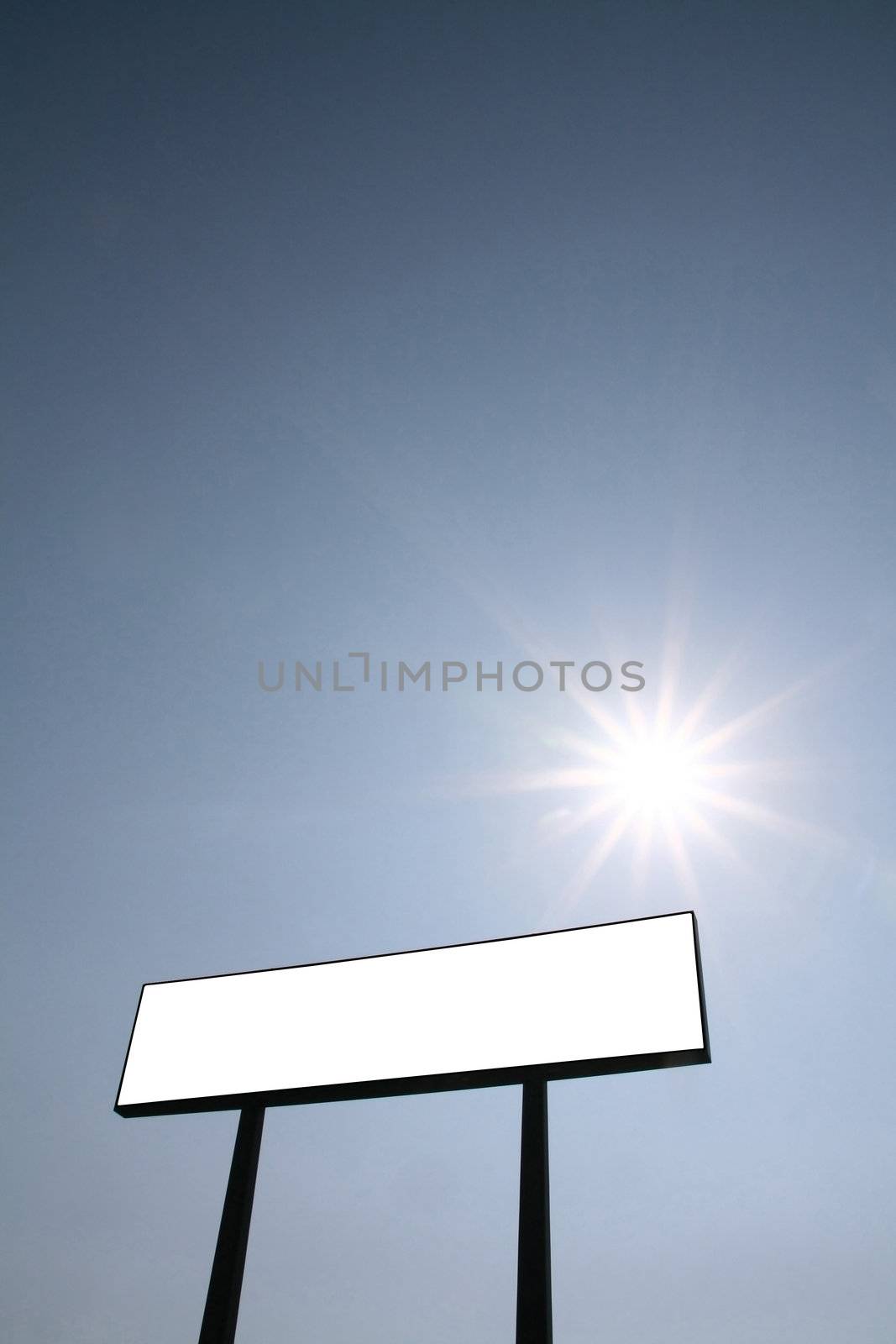 Photo of a blank billboard and the sun shining, add your advertisement