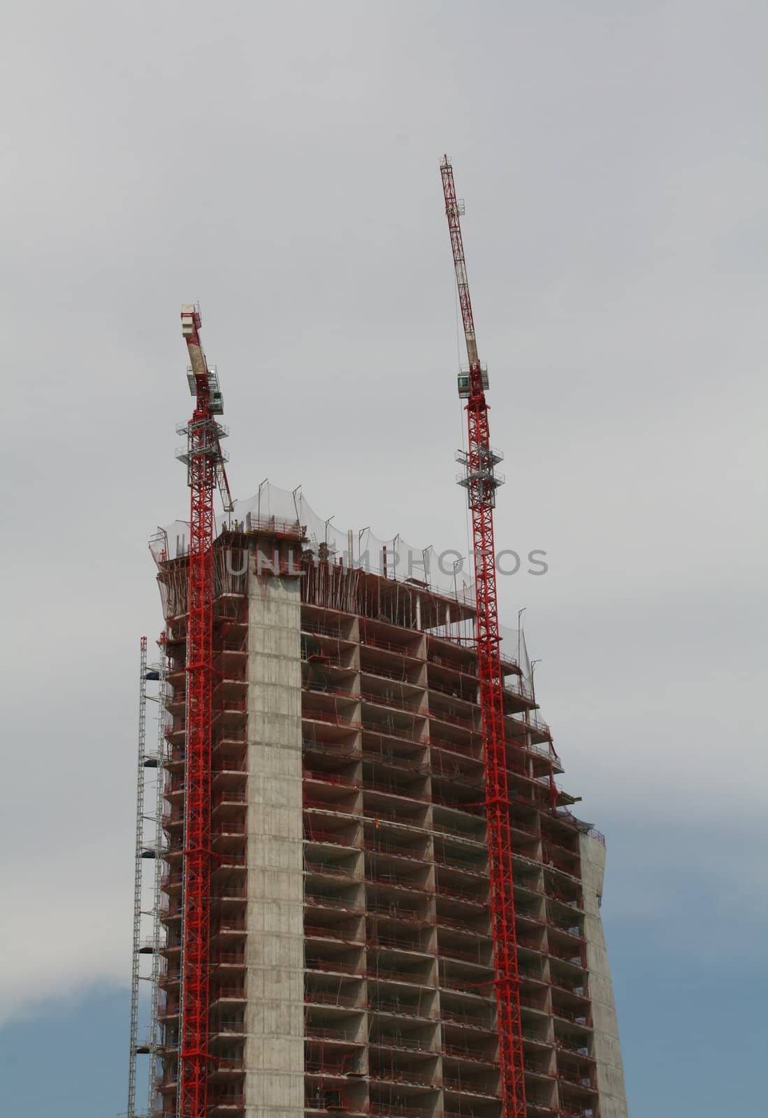 modern building construction work site, blue sky background
