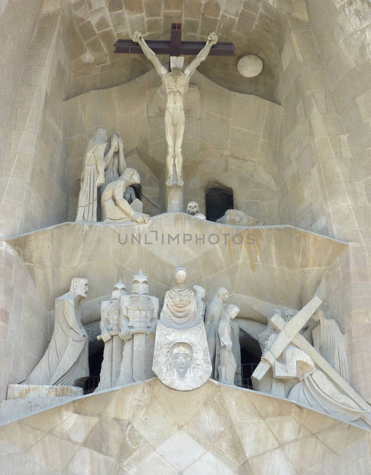 Statues at the entrance of the Sagrada familia, Barcelona, Spain by Elenaphotos21