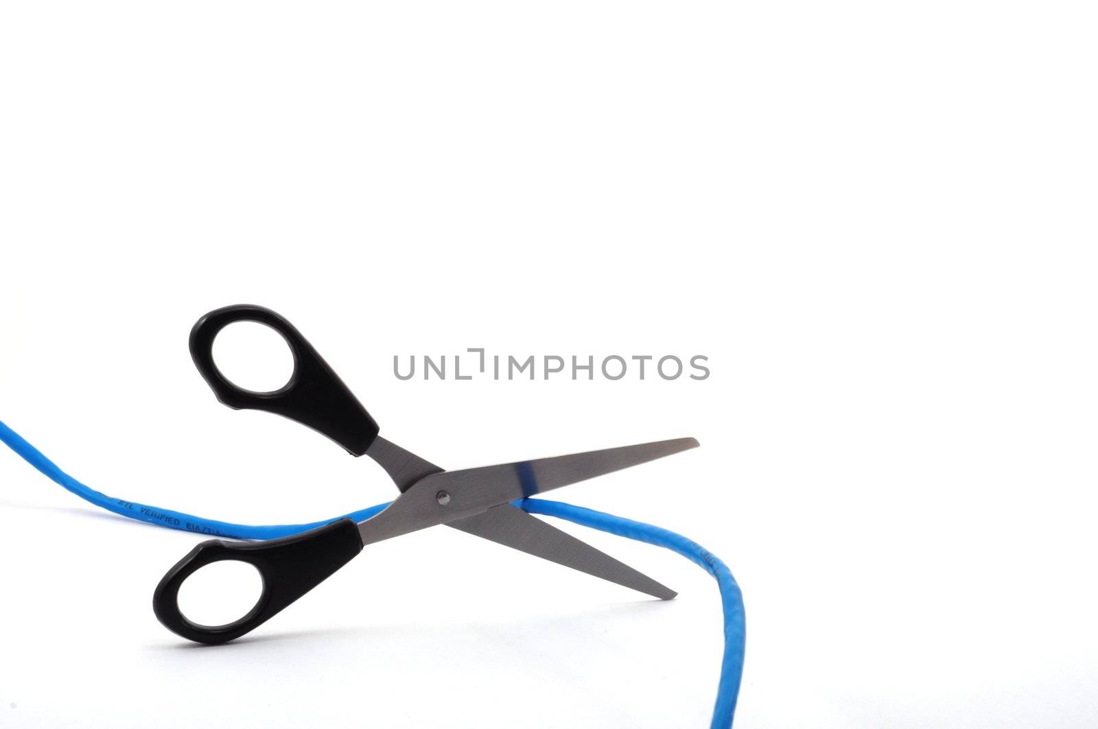 internet addiction concept with scissors and blue network cable on white