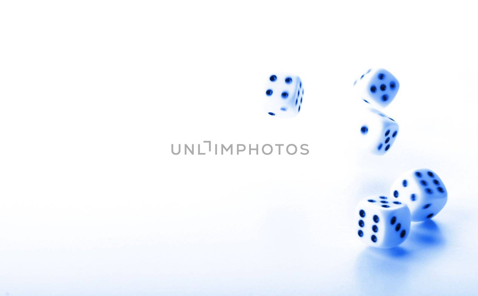 throwing dices in blue showing gambling or winning concept