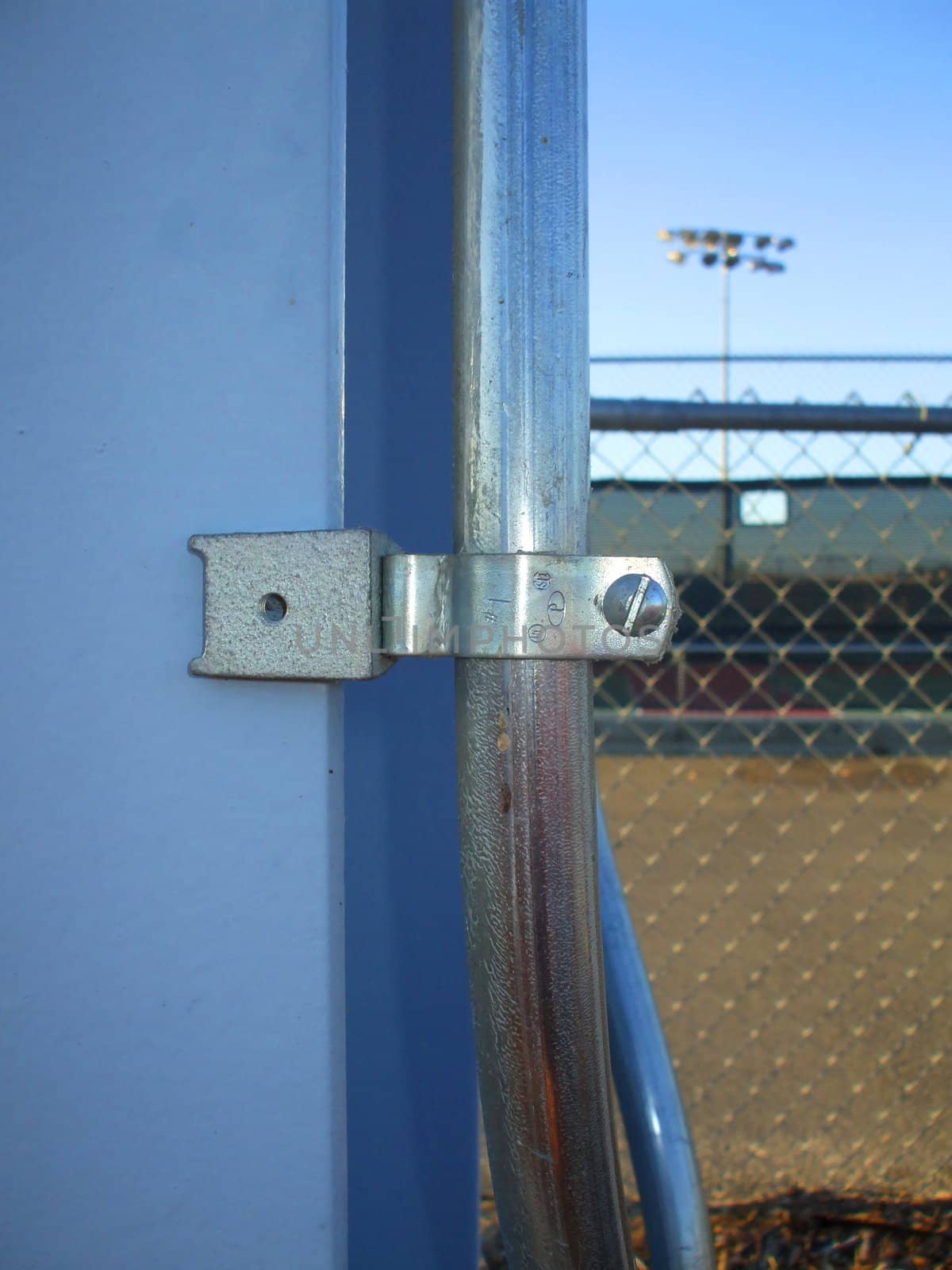 Close up of the metal pipe strap.