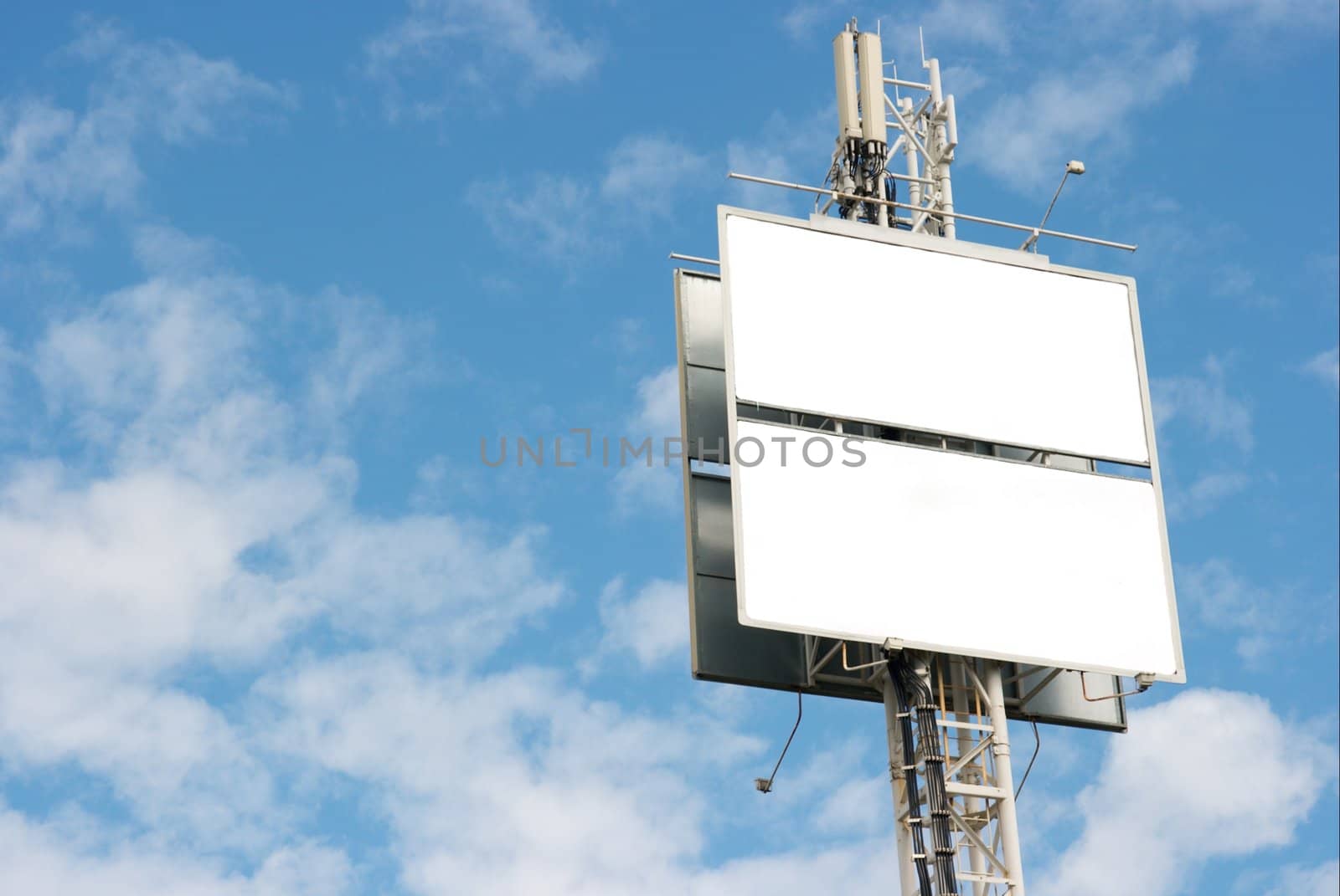 Empty billboard against blue sky, add your own text