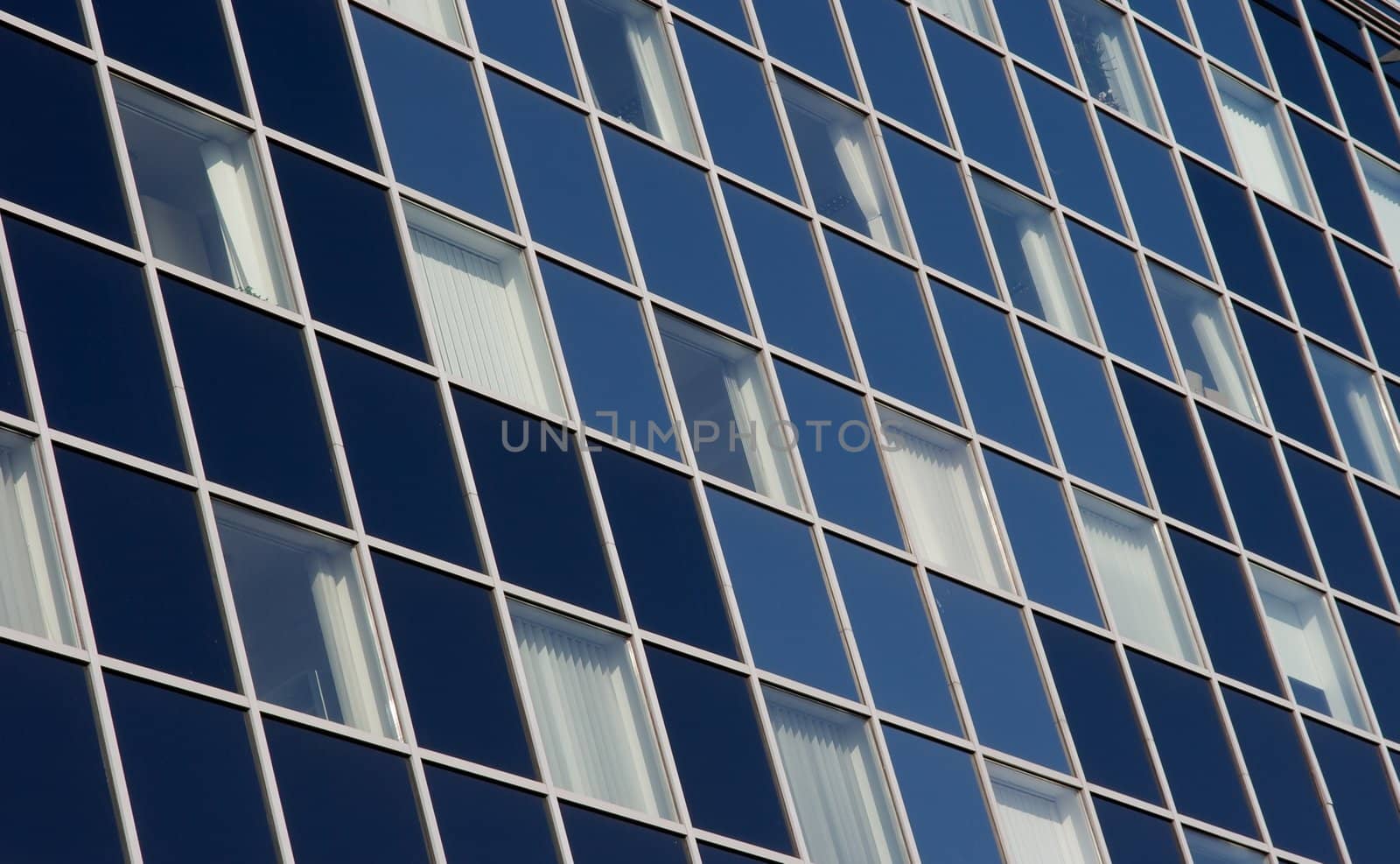 Detail of a modern, blue office building