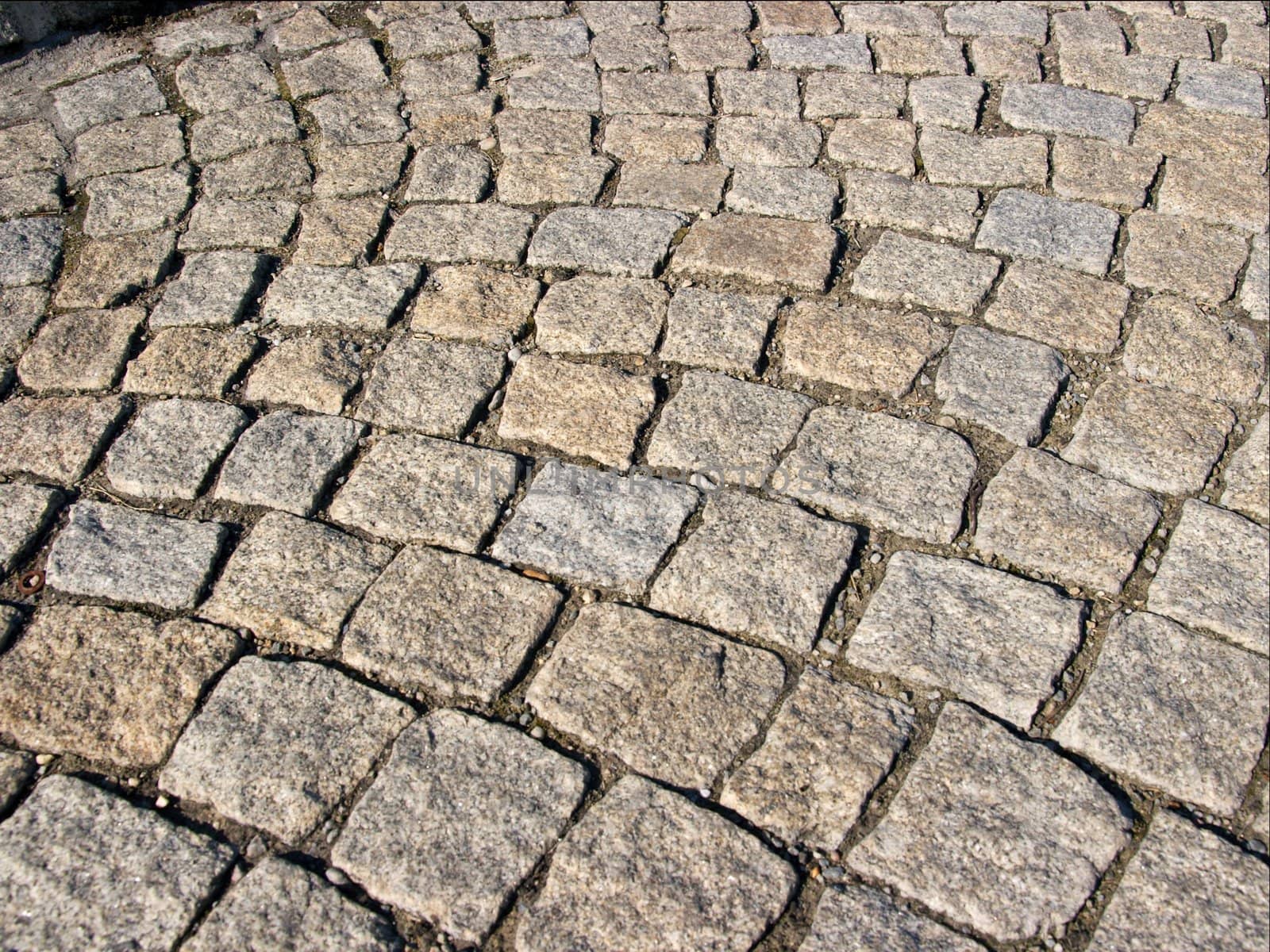 Pavement made of small gray stones