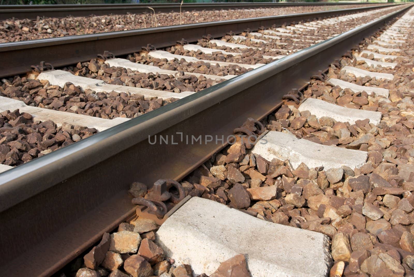 Straight railway tracks close up