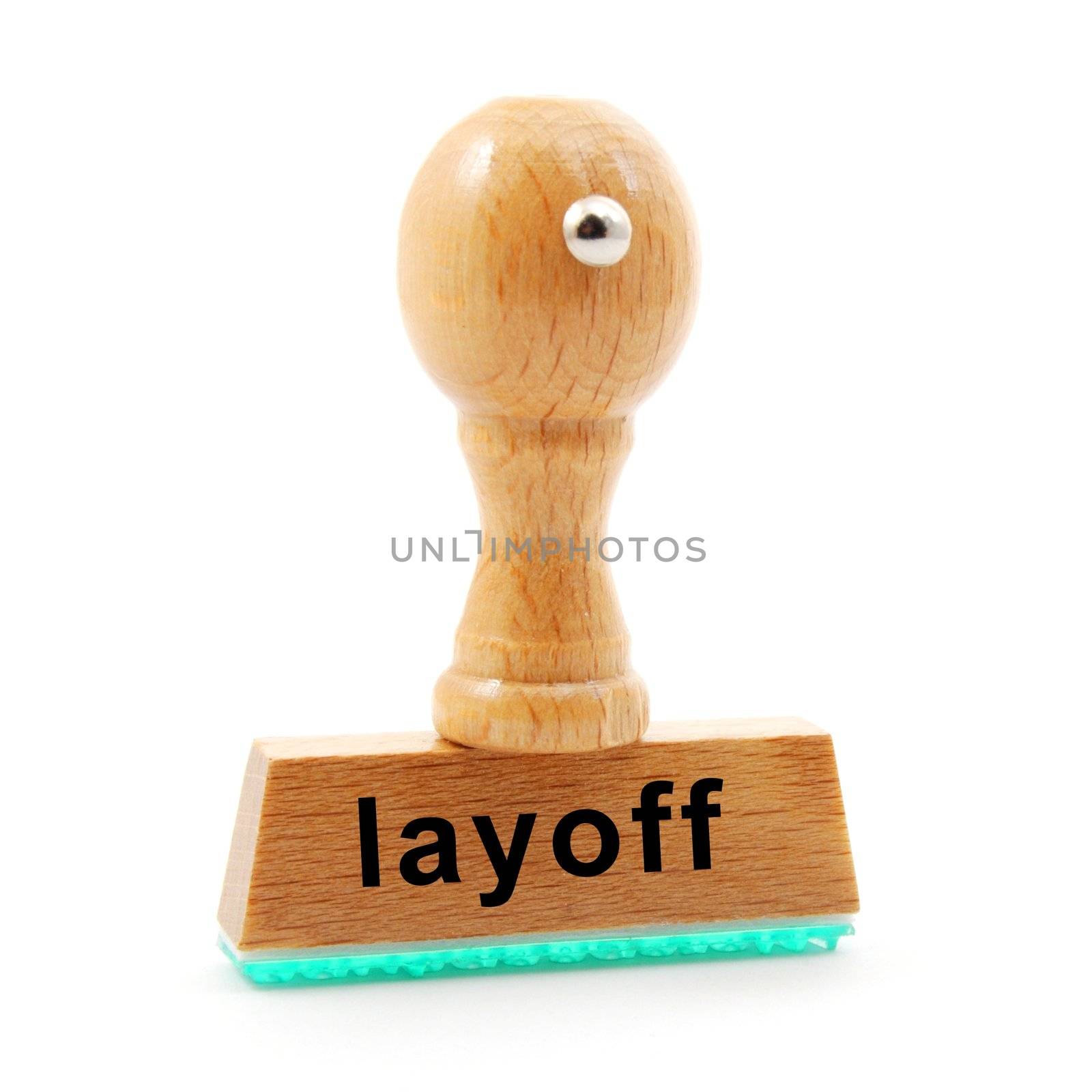 layoff stamp in business office showing unemployment concept
