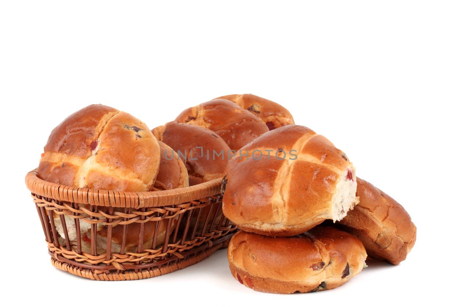 hot cross buns in a basket, white background