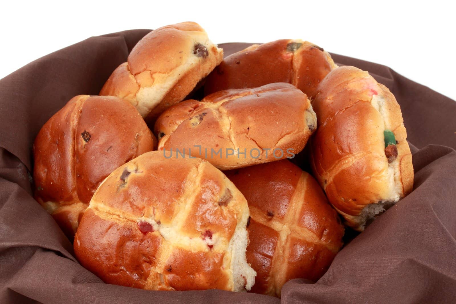 hot cross buns in a basket, white background