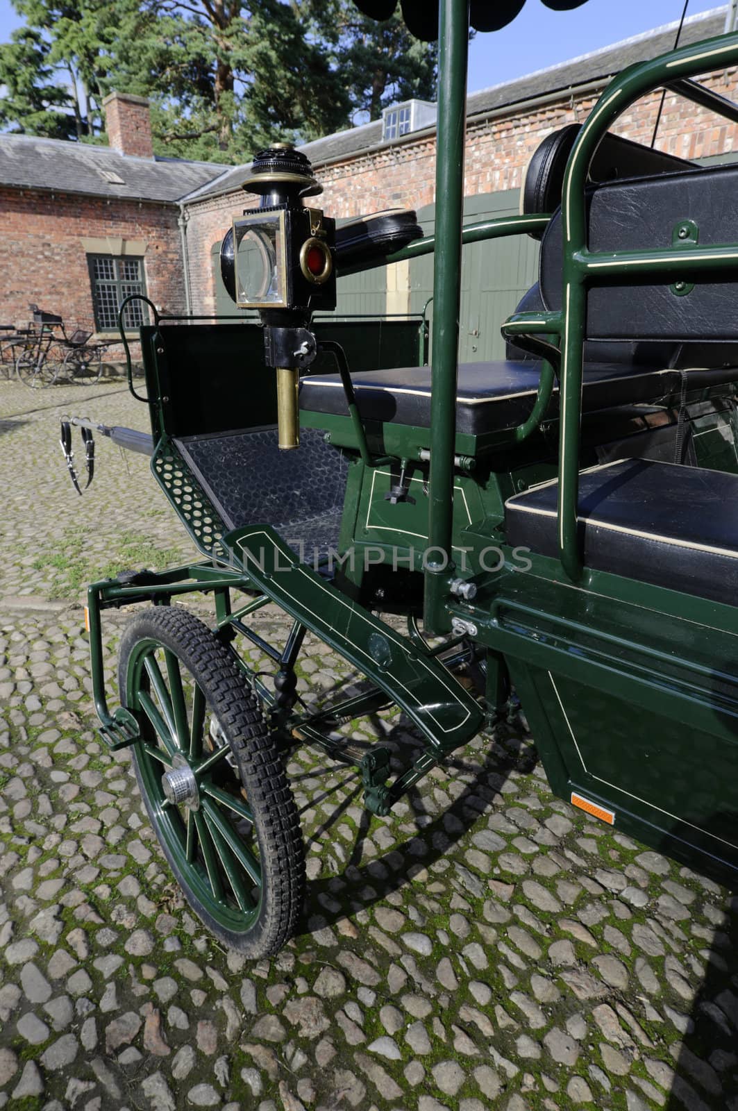 Candle powered headlight on a horse drawn carriage