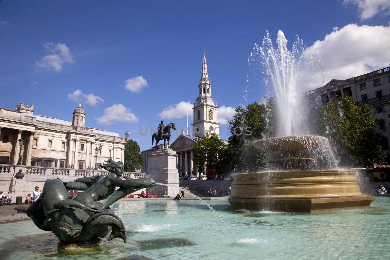 Trafalgar Square Fountains and St. Martin in the Fields Church by chrisdorney