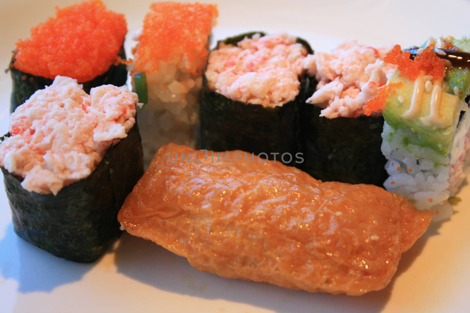 Close up of sushi assortment on a platter.