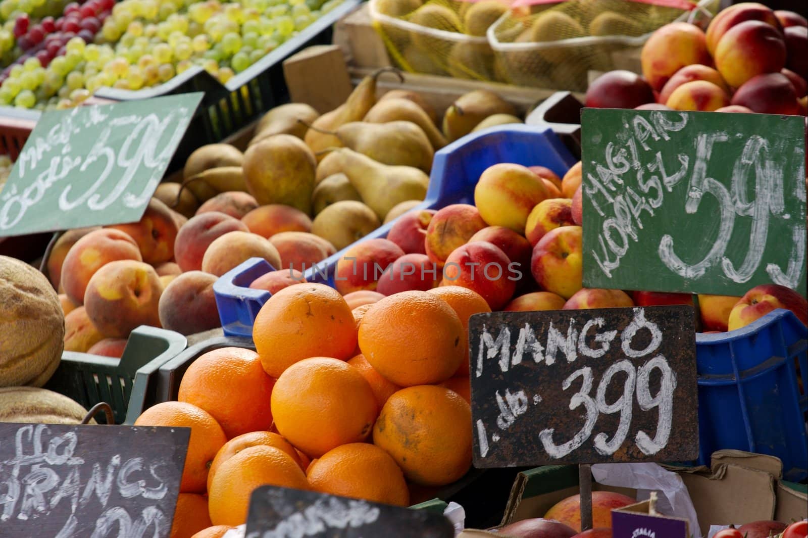 Piles of various fruits at a marketplace
