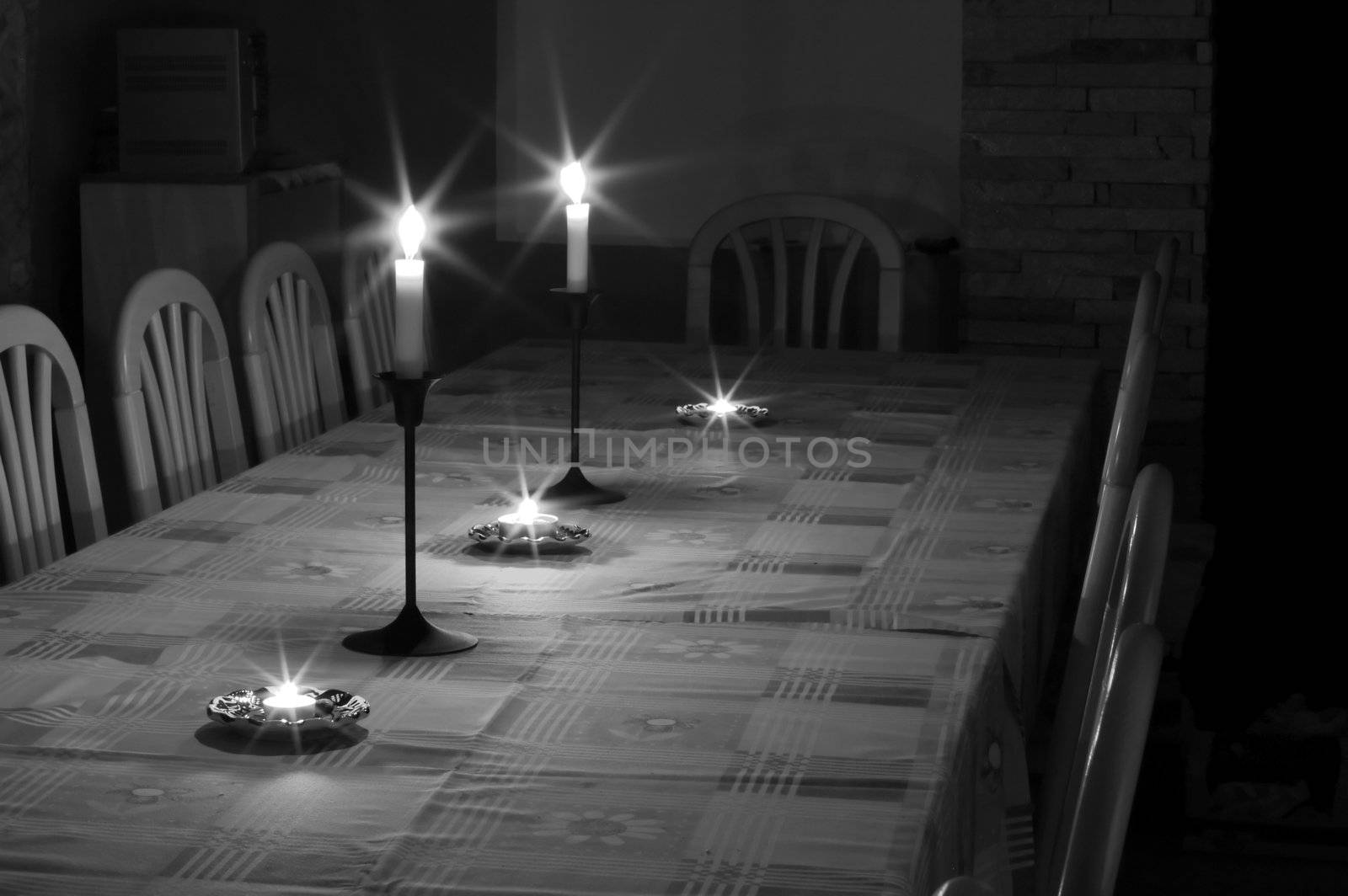Table of a dining room in soft candlelight