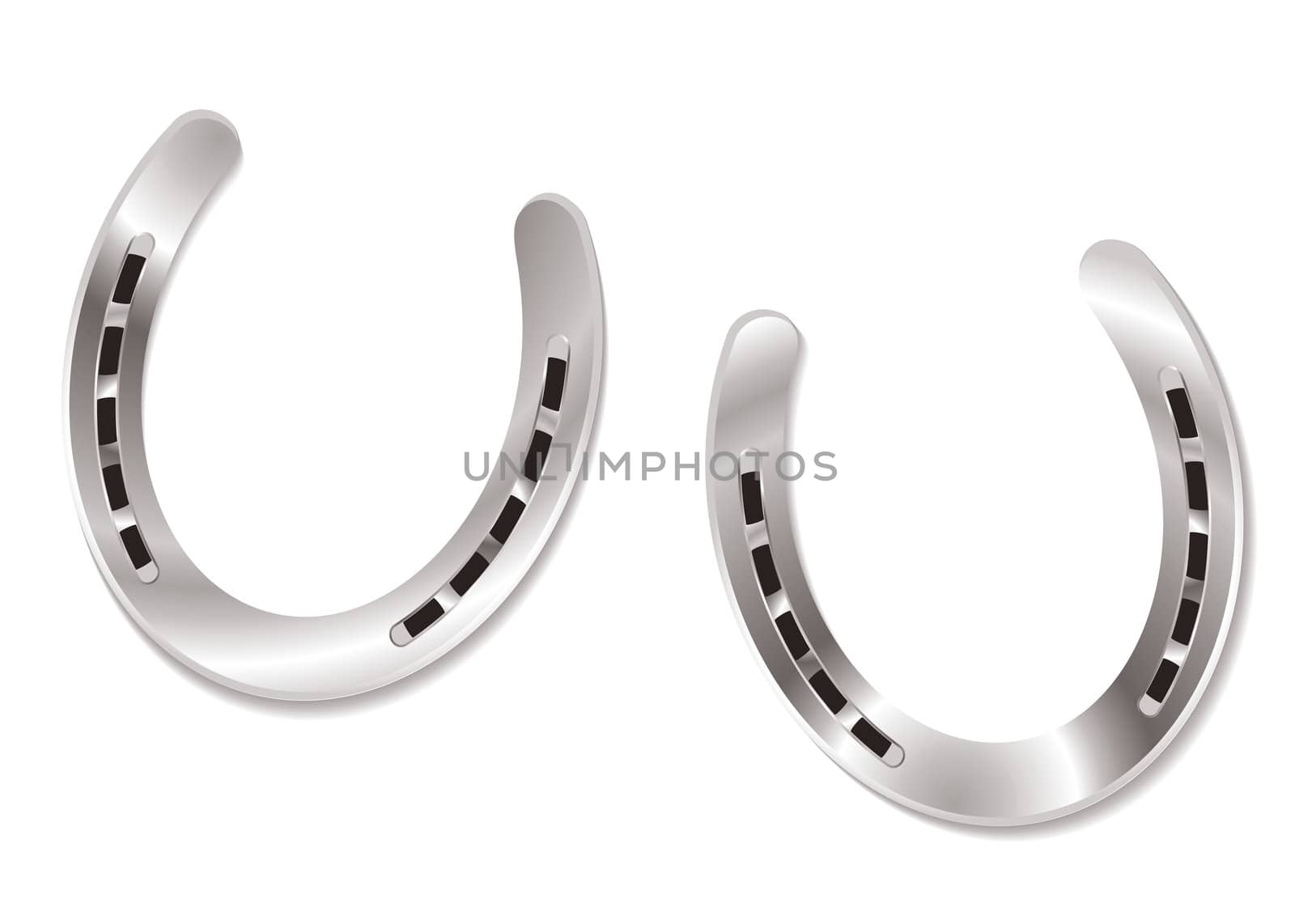 Two silver horseshoes with light reflection lucky charm concept