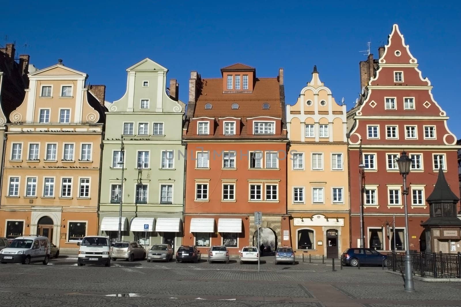 Colorful tenement houses in Wroclaw city - Flower Square, Poland. Redecorated and repainted houses in old style.