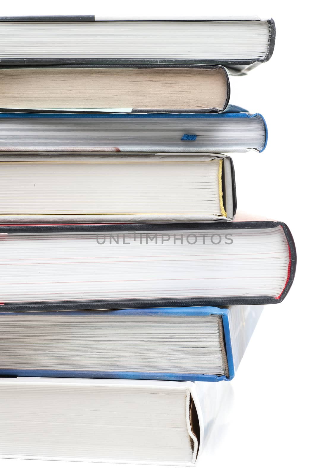 pile of books on white background