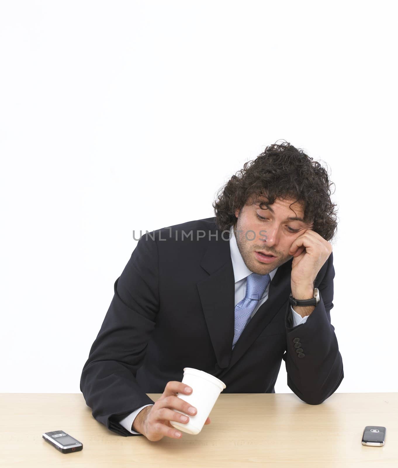 businessman relaxing over his desk