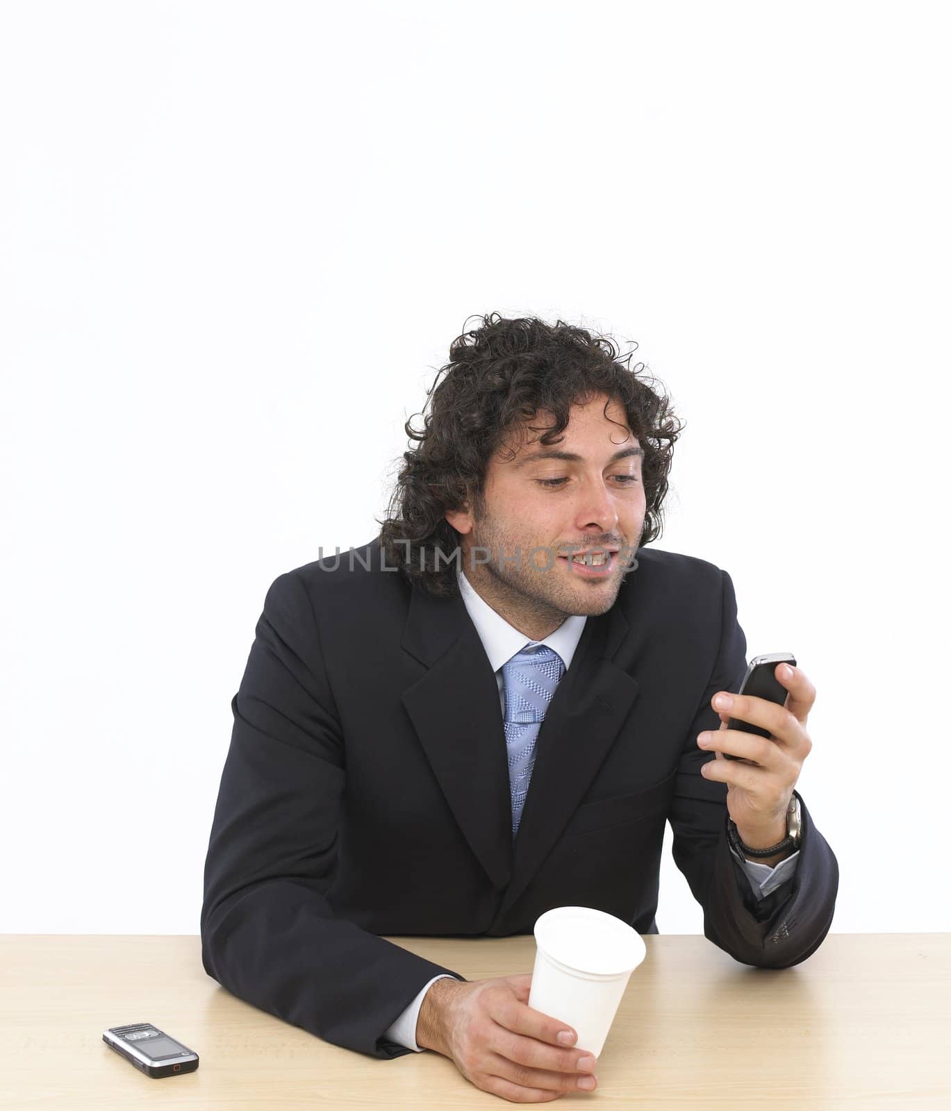 businessman relaxing over his desk
