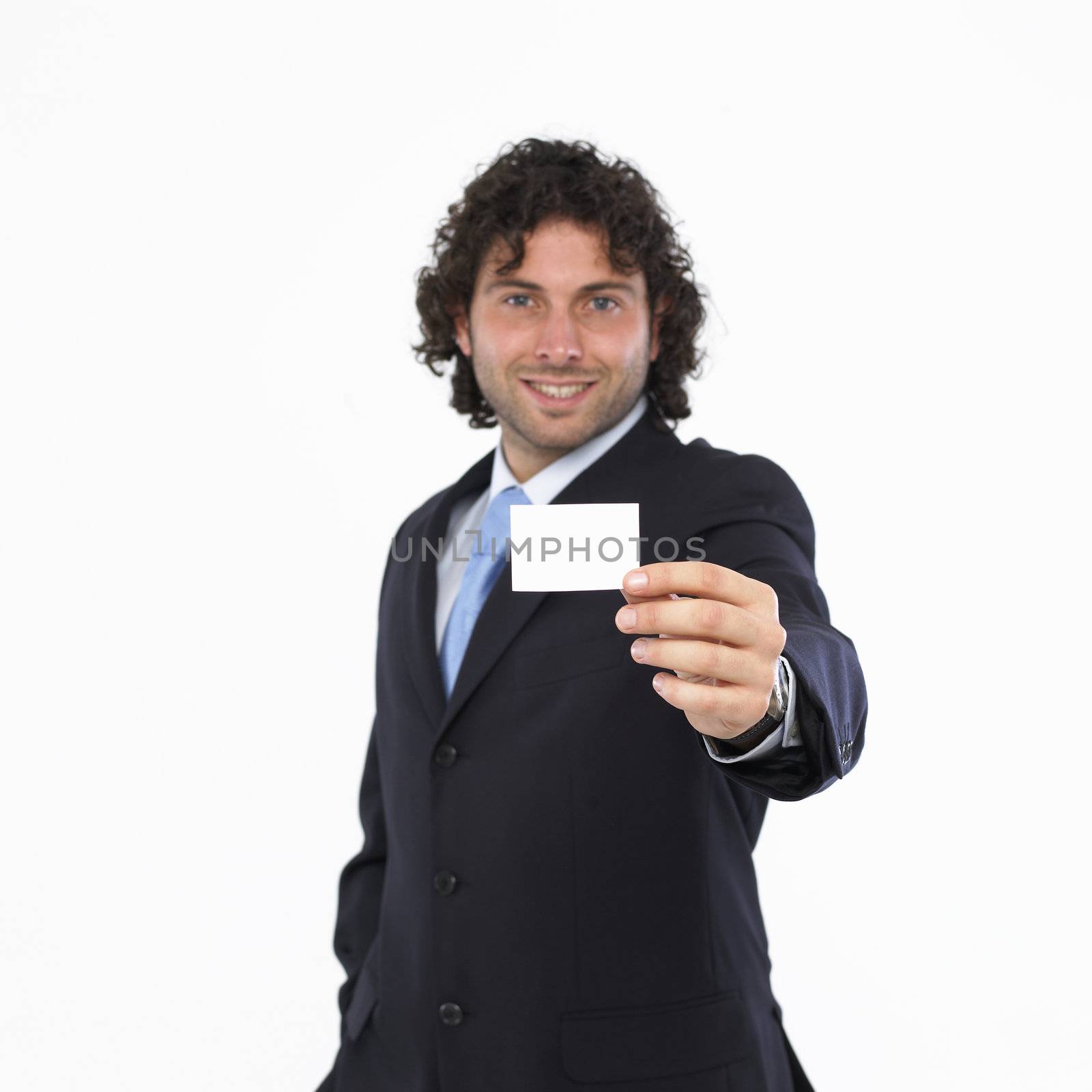 Man with business card in the hand by studiovitra