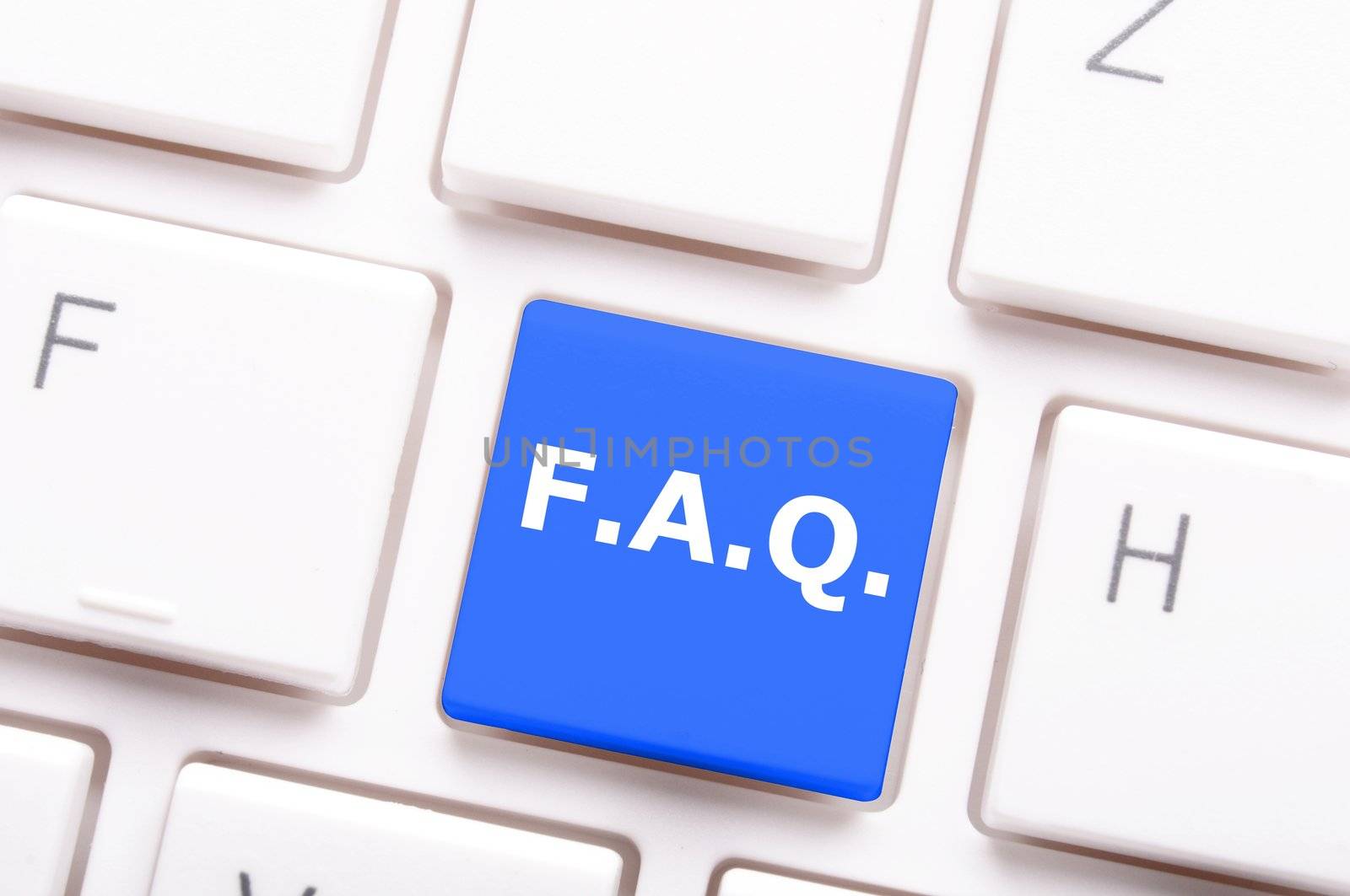 faq or frequently asked questions concept with computer key