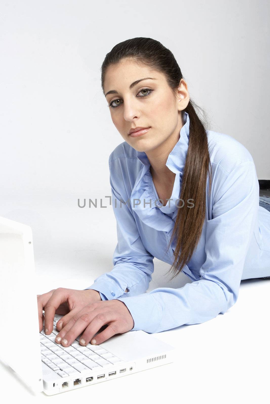 isolated young girl with laptop