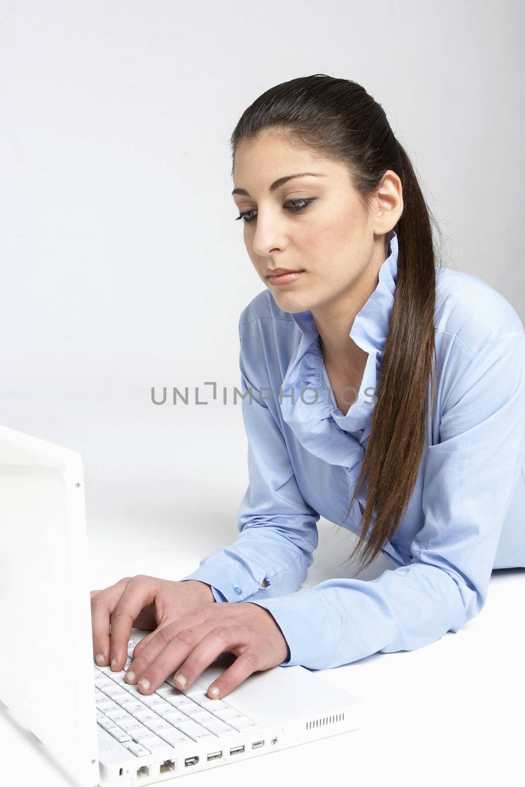 isolated young girl with laptop
