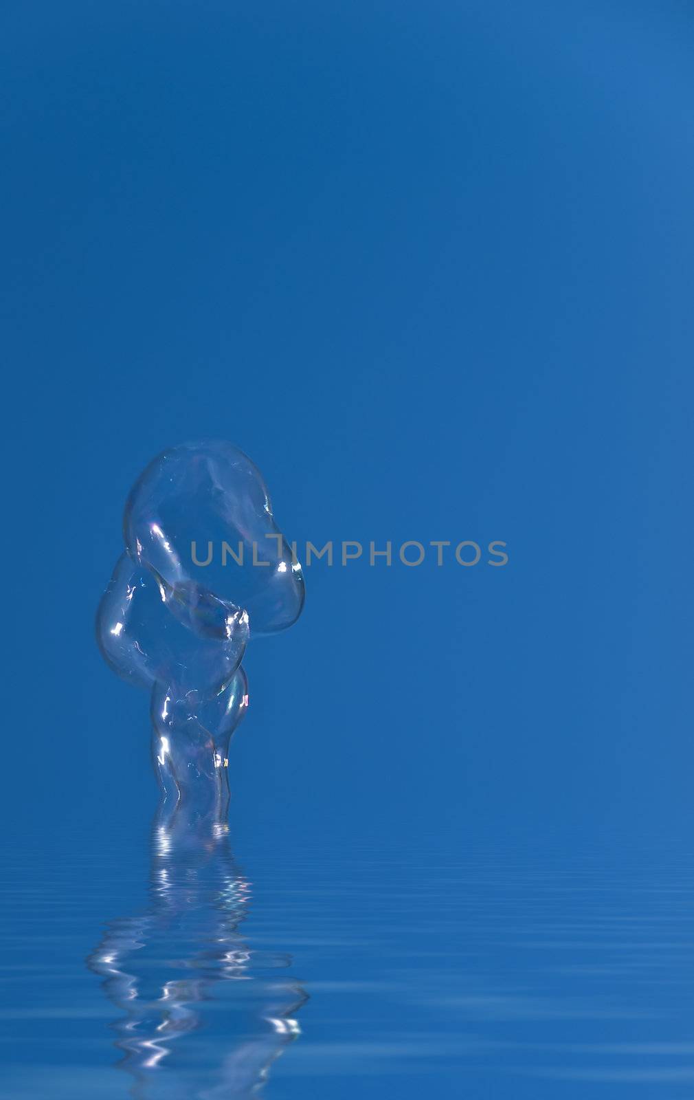 Abstract image of soap water bubble coming out of water