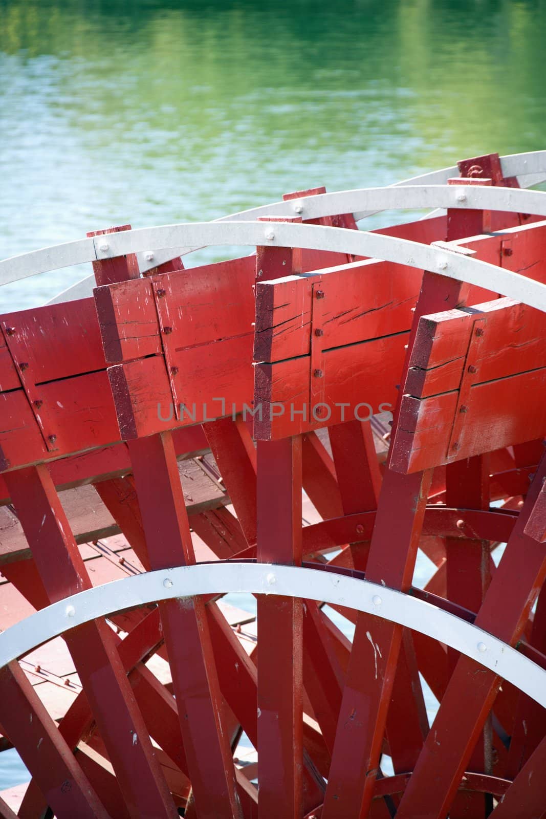 Close-up of red paddlewheel of riverboat in Sacramento, California, USA.