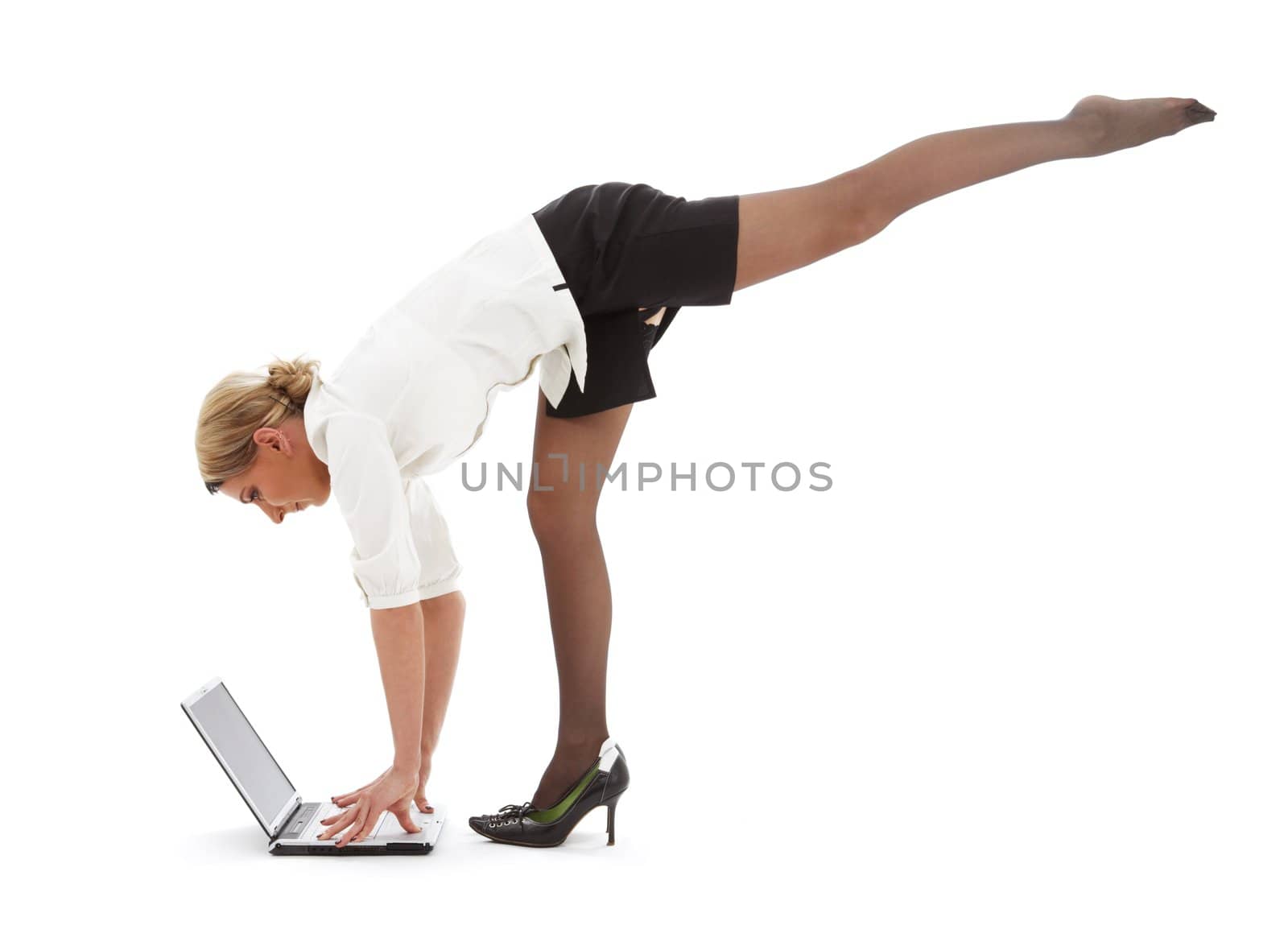 flexible businesswoman with laptop computer over white