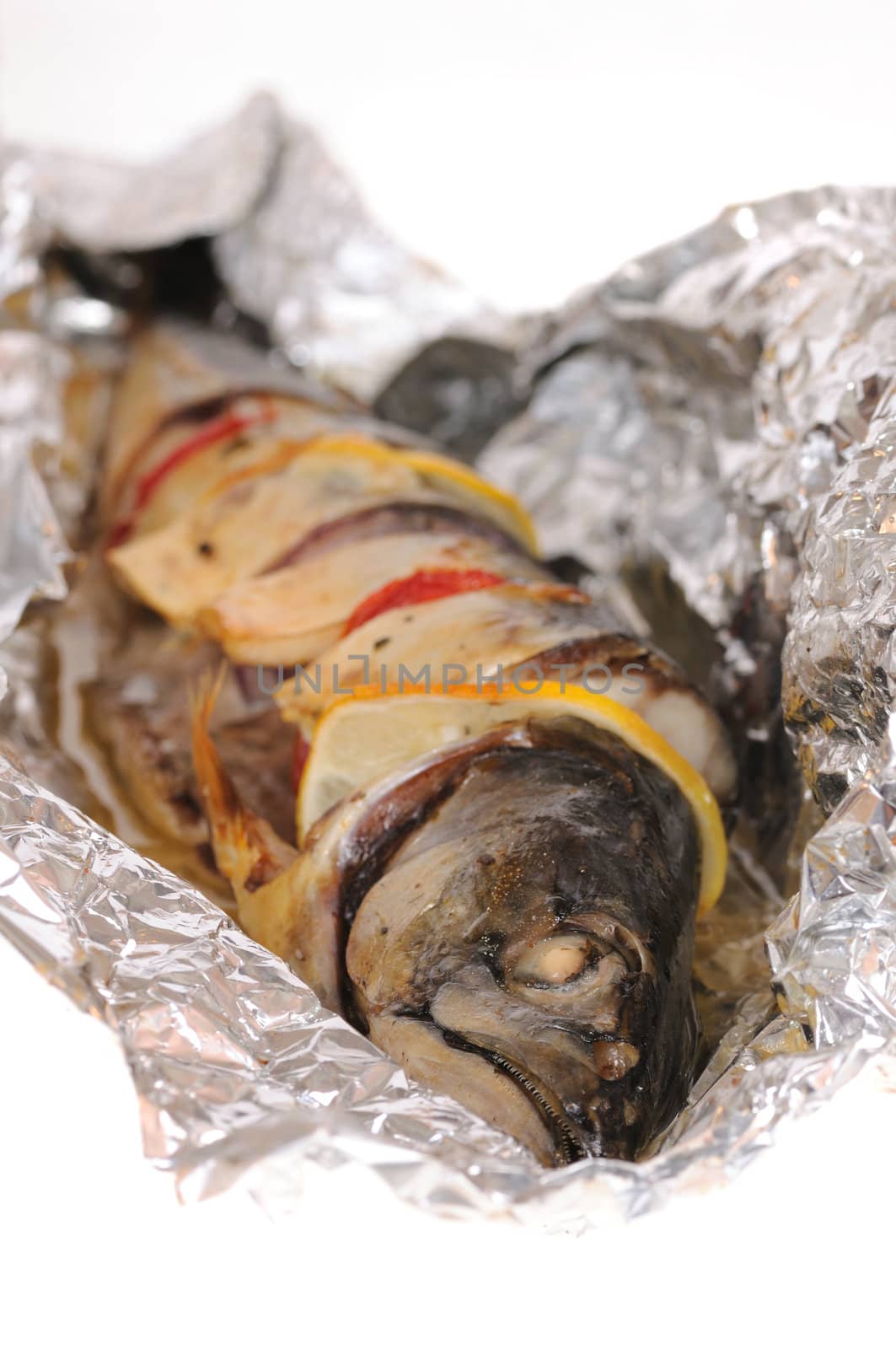 Mackerel prepared in a foil isolated on white background