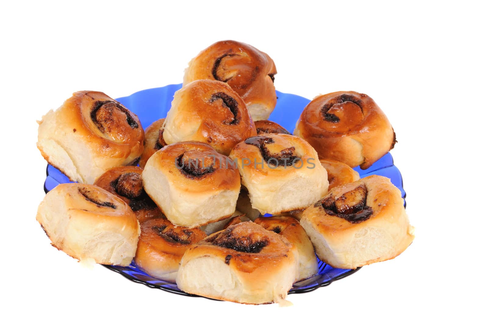 Sweet roll on blue plate isolated on white background