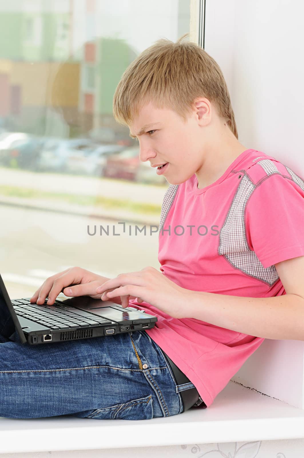 teenager with laptop by uriy2007