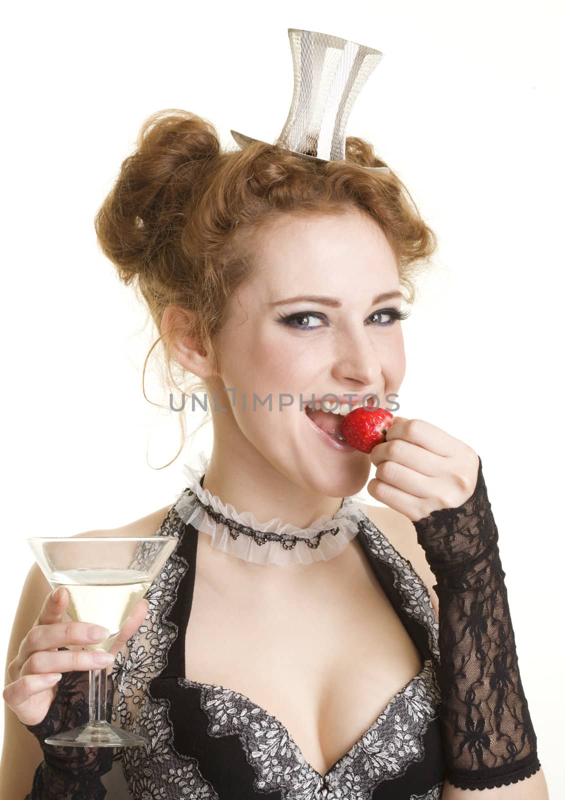 Smiling girl with strawberry and glass of vermuth