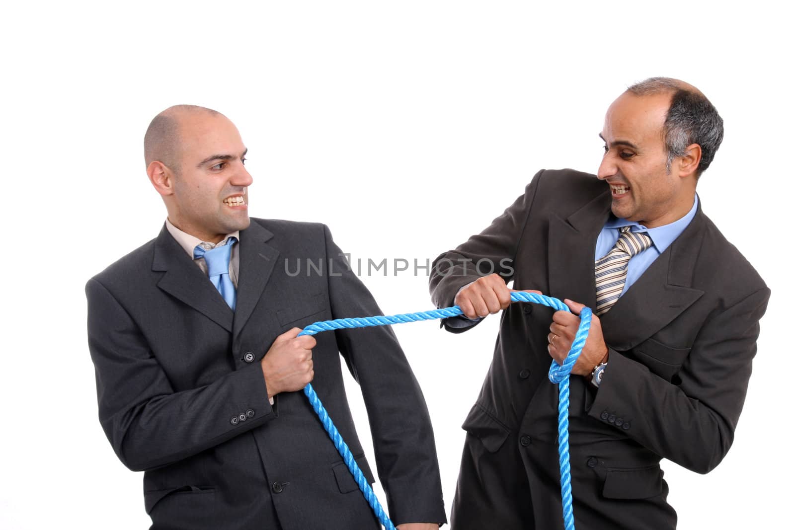 Businessman pulling on a piece of rope
