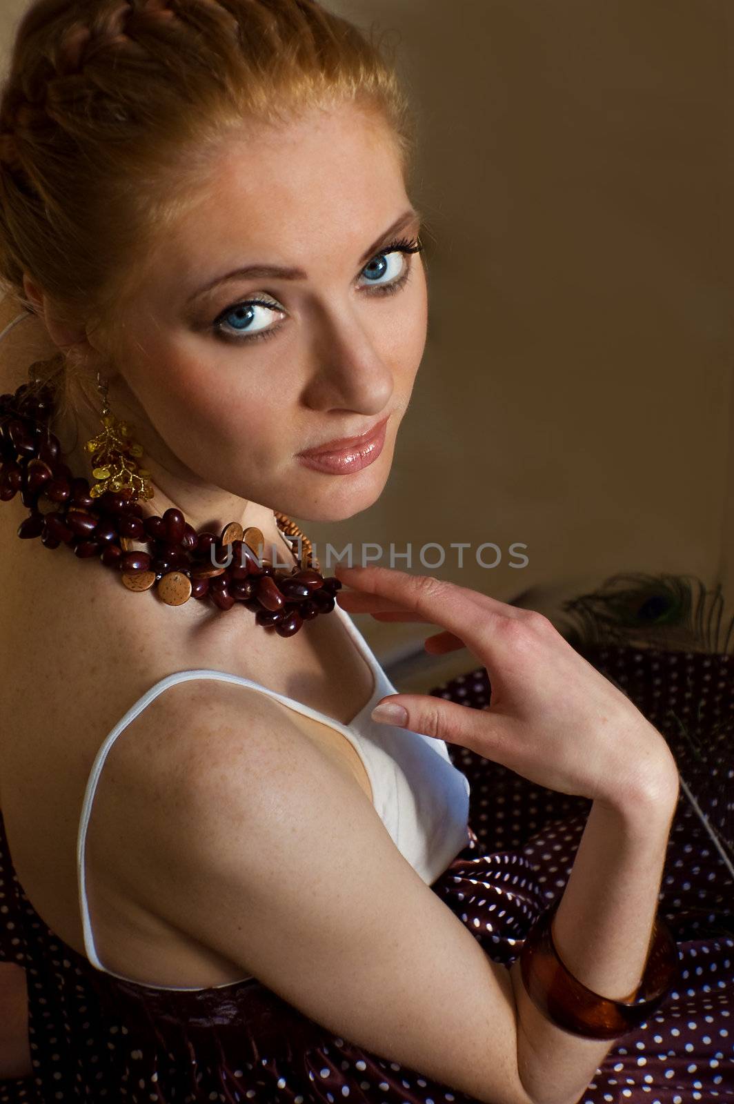 Retro style woman with amber jewelery