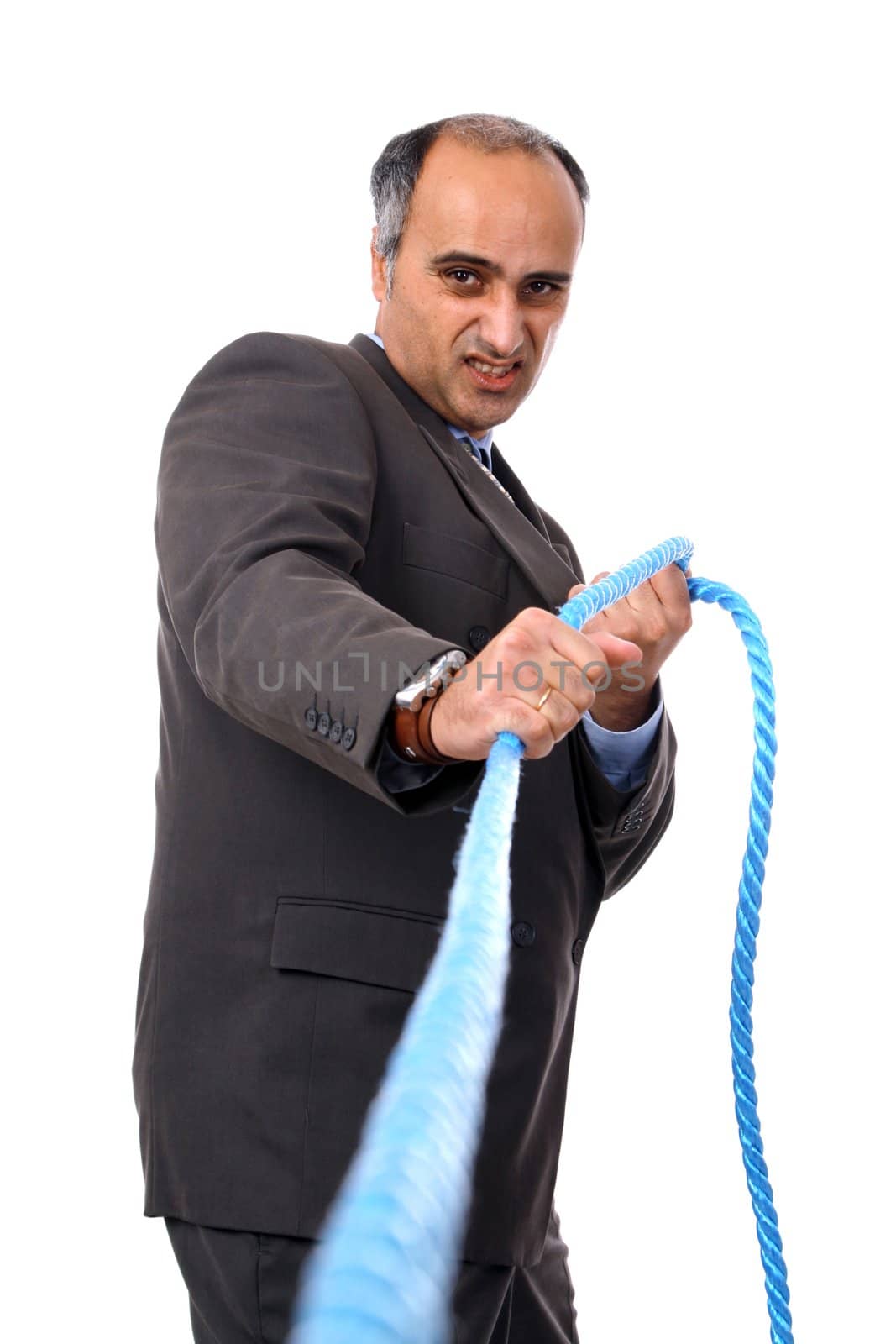 Businessman pulling on a piece of rope