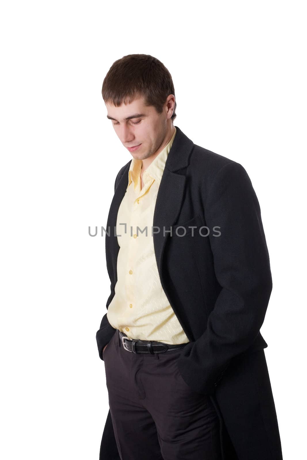 Young man in topcoat isolated over white