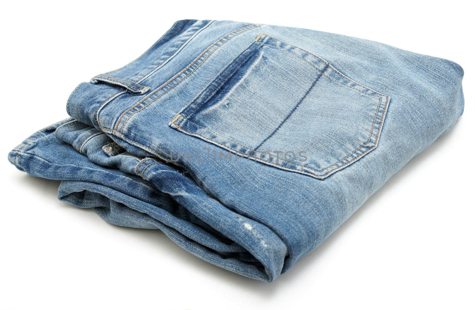 A pair of blue denim jeans on white background.