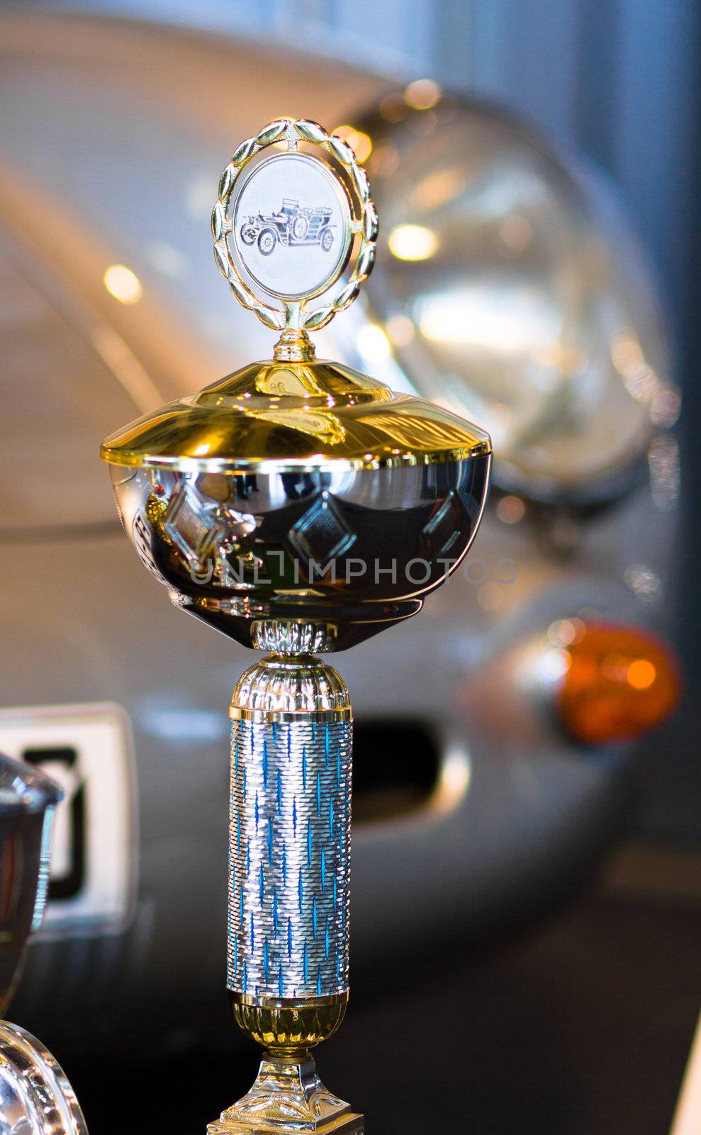 Trophy for car race winning or medal on background with a Automobile