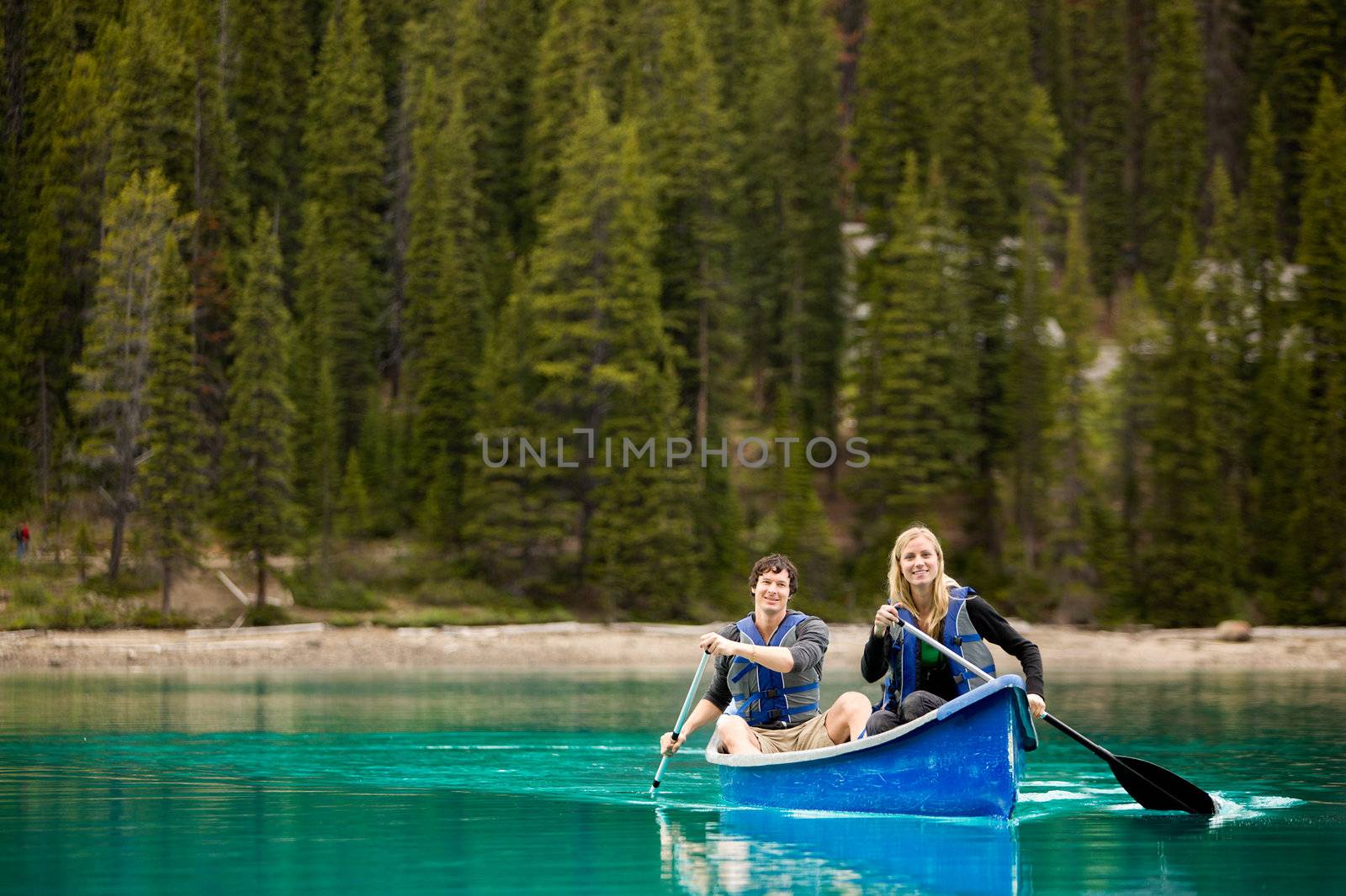 Couple Portrait in Canoe by leaf