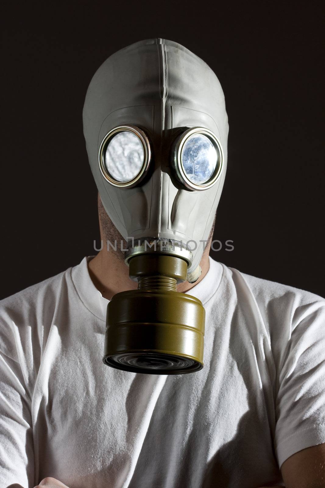 a man wearing a gas mask environment danger concept image