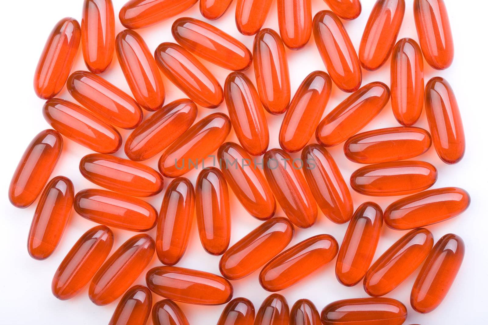 red tablets isolated on white background