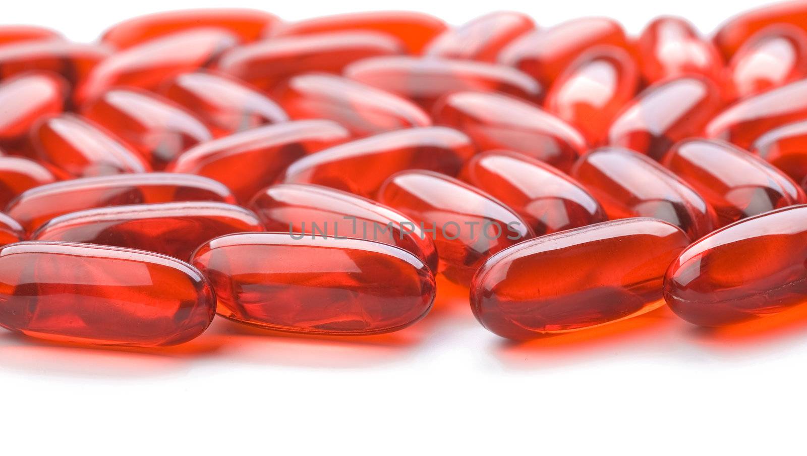 red tablets isolated on white background