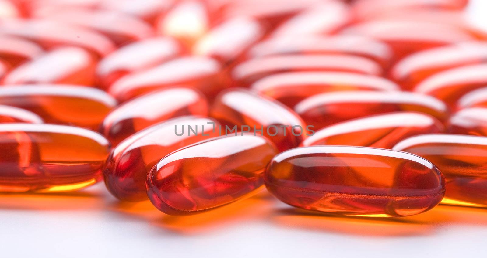 red tablets on white background